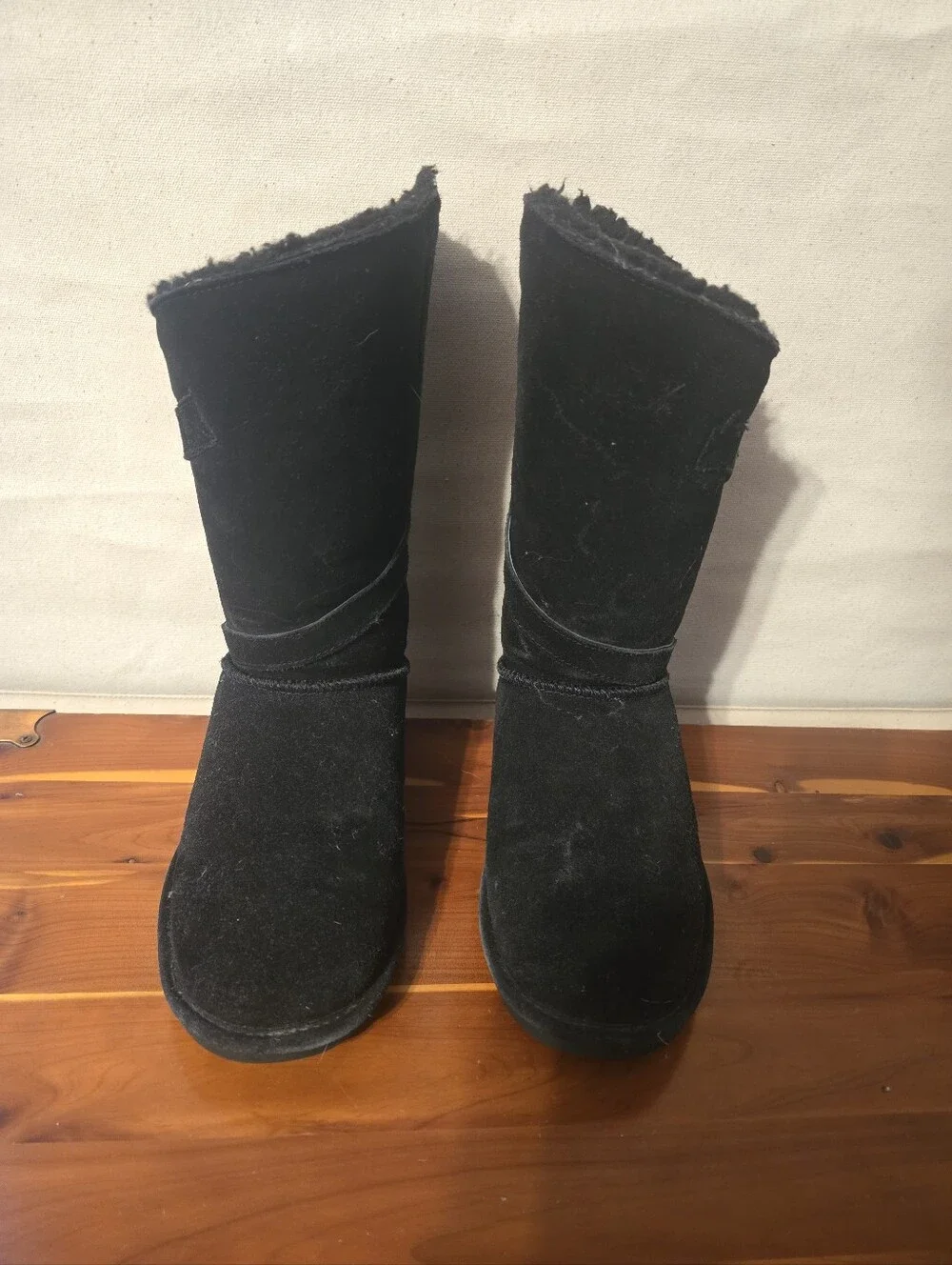 BearPaw tall black sheepskin lined boots